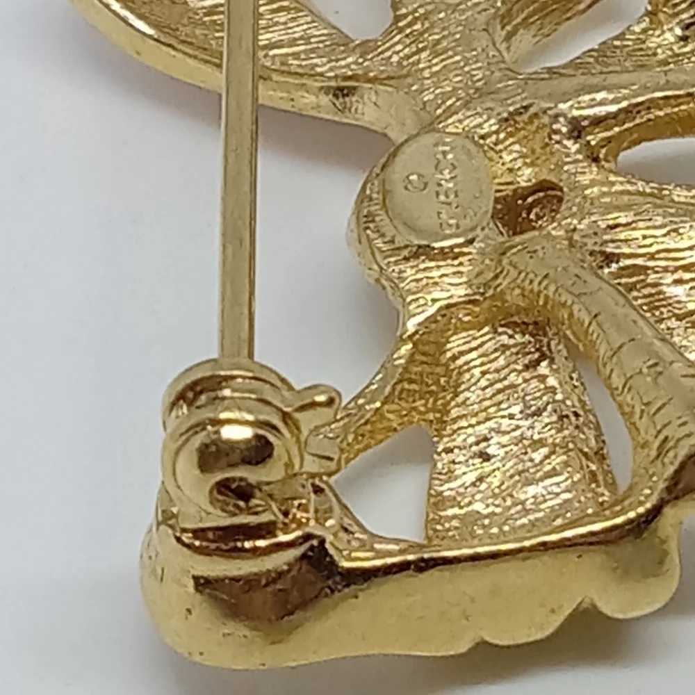* vintage Givenchy gold tone ribbon bow pin brooch